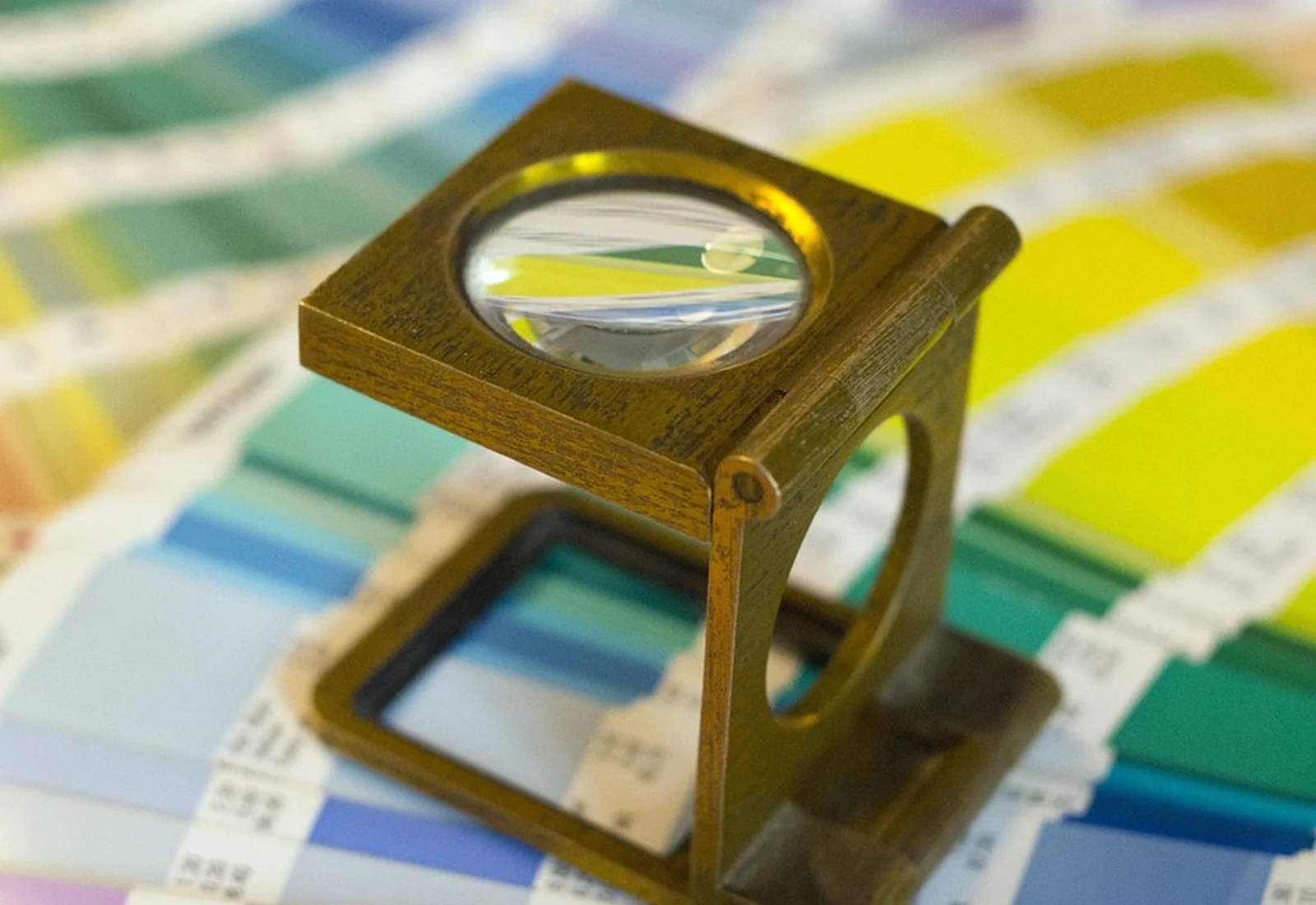 Magnifier used to inspect printed colour samples during packaging approval