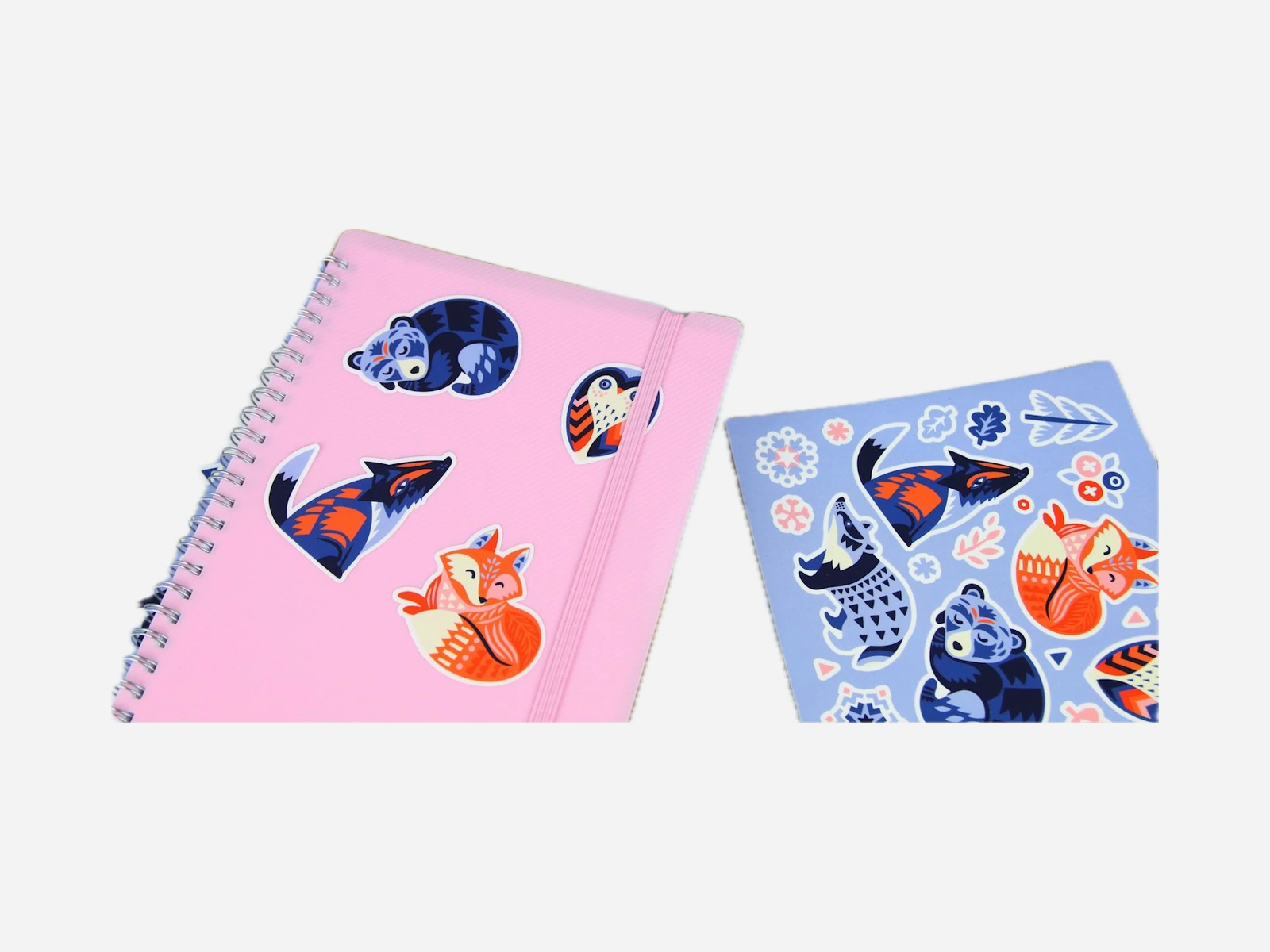 Printed kiss-cut sticker sheet and labels applied to a notebook
