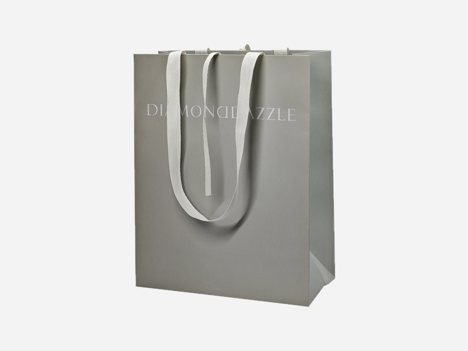Gray retail paper bag with ribbon handles