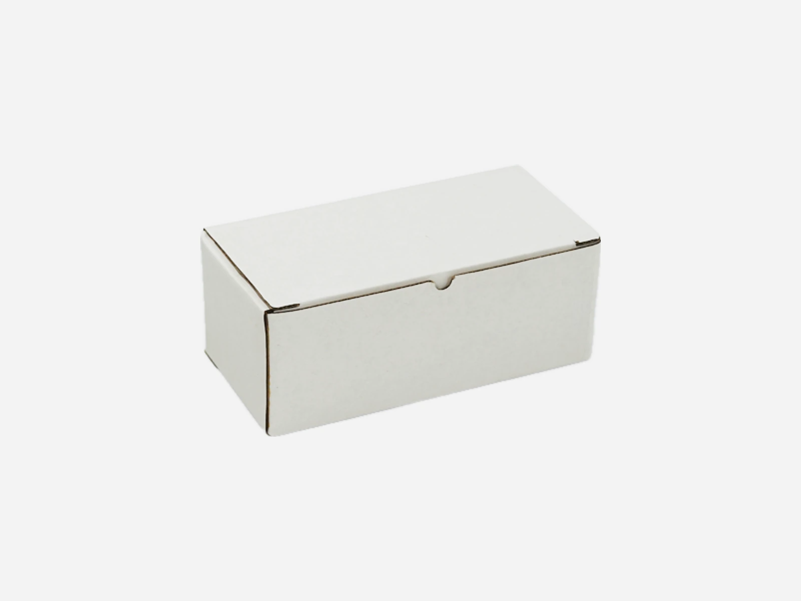 White paperboard box with a tuck-in closure
