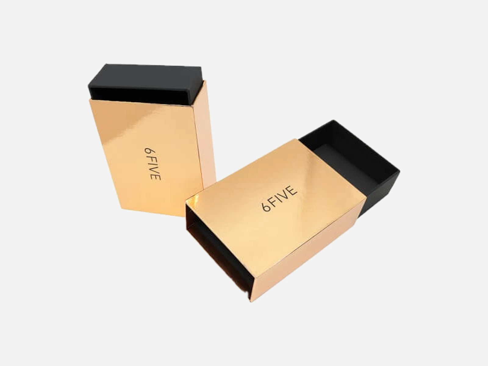 Two printed lid-and-base paper boxes